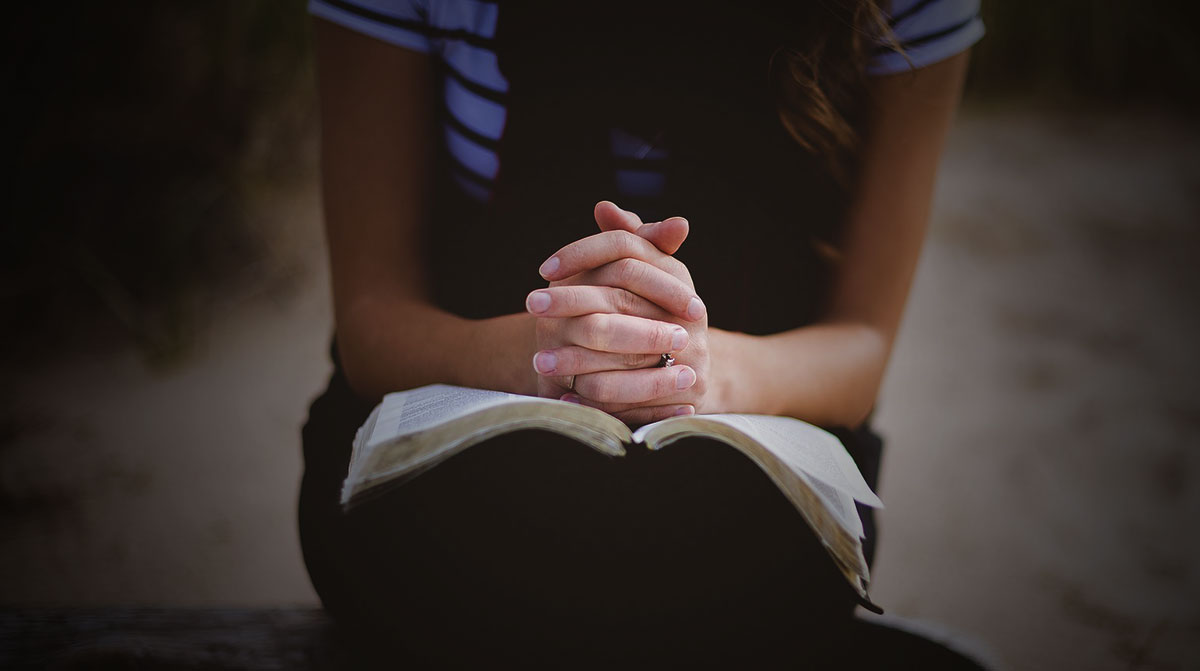Praying over a bible